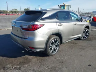2022 Lexus RX with VIN 2T2HZMAA7NC255857, listed as a IAAI auction lot 41396704 with 27,631 mi miles. Bid and sale history available at carsss.com. Image 3.
