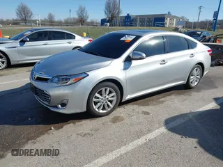 2013 Toyota Avalon XLE with VIN 4T1BK1EB9DU031079, listed as a IAAI auction lot 41809315 with 93,331 mi miles and . Bid and sale history available at DreamBid. Image 2.
