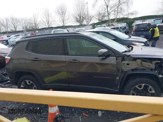 2017 Jeep Compass Trailhawk with VIN 3C4NJDDB9HT657173, listed as a IAAI auction lot 41613348 with 60,781 mi miles and . Bid and sale history available at DreamBid. Image 14.