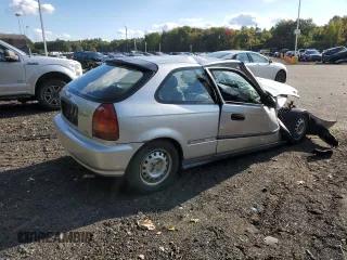 1998 Honda Civic CX with VIN 2HGEJ6427WH121499, listed as a Copart auction lot 73657704 with 101,999 mi miles and Salvage Title. Bid and sale history available at DreamBid. Image 3.