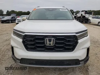 2024 Honda Pilot Touring z VIN 5FNYG2H74RB011187, wystawiony jako Copart lot #79999324 z przebiegiem 16 123 mil mil oraz Szkoda całkowita • Salvage title. Historia ofert i sprzedaży dostępna na DreamBid. Obrazek 5.