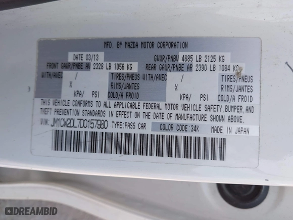 2013 Mazda Mazda5 Grand Touring with VIN JM1CW2DL7D0157980, listed as a IAAI auction lot 42114014 with 201,562 mi miles. Bid and sale history available at carsss.com. Image 9.