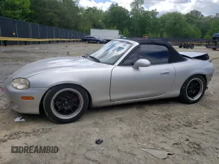 2004 Mazda MX-5 Miata LS z VIN JM1NB353640400140, wystawiony jako Copart lot #56127165 z przebiegiem 123 276 mil mil oraz Szkoda całkowita • Salvage title. Historia ofert i sprzedaży dostępna na DreamBid. Obrazek 1.
