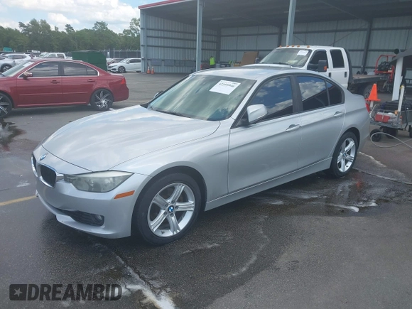 2014 BMW 3 Series 328i with VIN WBA3A5C50EP602200, listed as a IAAI auction lot 42555946 with 93,576 mi miles and . Bid and sale history available at DreamBid. Image 2.