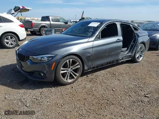 2019 BMW 4 Series 430i with VIN WBA4J1C50KBM17571, listed as a IAAI auction lot 41719938 with 89,552 mi miles. Bid and sale history available at carsss.com. Image 18.
