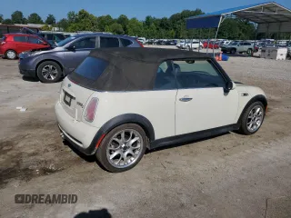 2006 MINI Convertible S с VIN WMWRH33546TF85908, выставлен на аукционе Copart как лот 61363025 с пробегом 105 053 миль миль и Списание • Salvage title. История ставок и продаж доступна на DreamBid. Изображение 3.