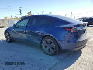 2021 Tesla Model 3 Long Range with VIN 5YJ3E1EBXMF925147, listed as a Copart auction lot 49741275 with 106,947 mi miles and Salvage Title. Bid and sale history available at DreamBid. Image 2.