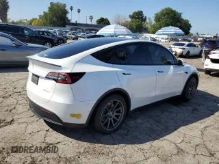 2021 Tesla Model Y Long Range with VIN 5YJYGDEEXMF146617, listed as a Copart auction lot 49347125 with 98,084 mi miles and Salvage Title. Bid and sale history available at DreamBid. Image 3.