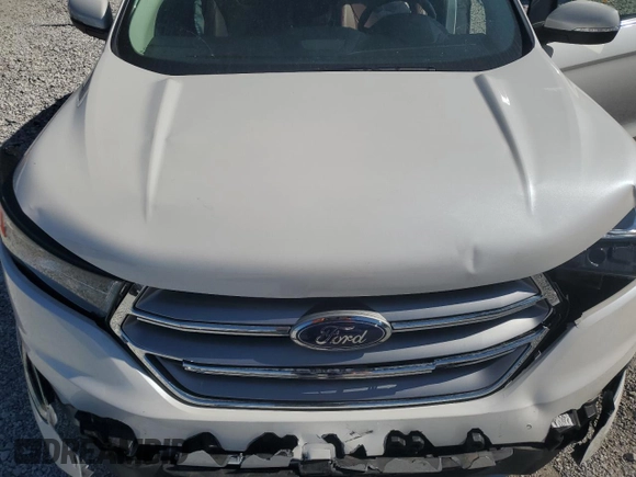 2015 Ford Edge Titanium z VIN 2FMTK4K84FBB64176, wystawiony jako Copart lot #57729005 z przebiegiem 50 654 mil mil oraz Szkoda całkowita • Salvage title. Historia ofert i sprzedaży dostępna na DreamBid. Obrazek 11.