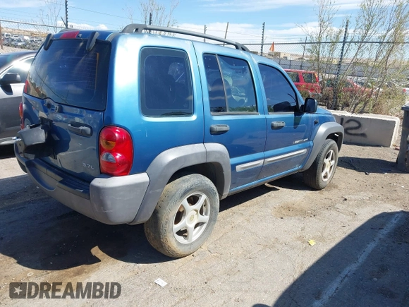 2003 Jeep Liberty Sport with VIN 1J4GL48K03W569834, listed as a IAAI auction lot 42061973 with 278,475 mi miles. Bid and sale history available at carsss.com. Image 4.