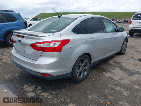 2014 Ford Focus SE with VIN 1FADP3F24EL323728, listed as a IAAI auction lot 41826974 with 141,357 mi miles and . Bid and sale history available at DreamBid. Image 4.