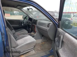 2002 Isuzu Rodeo S with VIN 4S2CK58W124320988, listed as a IAAI auction lot 41921874 with 227,320 mi miles and . Bid and sale history available at DreamBid. Image 5.