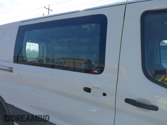 2018 Ford Transit with VIN 1FTYR1YM7JKA63317, listed as a IAAI auction lot 42216955 with 220,502 mi miles and . Bid and sale history available at carsss.com. Image 6.