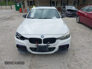 2014 BMW 3 Series 328i with VIN WBA3A5C59EP601126, listed as a IAAI auction lot 41921844 with 124,844 mi miles. Bid and sale history available at carsss.com. Image 12.