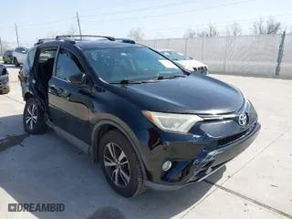 2016 Toyota RAV4 XLE with VIN 2T3WFREV9GW292772, listed as a IAAI auction lot 41727898 with 117,922 mi miles. Bid and sale history available at carsss.com. Image 1.