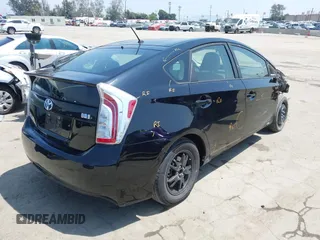 2014 Toyota Prius Four with VIN JTDKN3DUXE1738737, listed as a IAAI auction lot 42159877 with 47,221 mi miles. Bid and sale history available at carsss.com. Image 4.