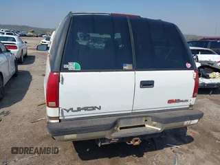 1996 GMC Yukon with VIN 1GKEK13R2TJ746811, listed as a IAAI auction lot 41955840 with 2,242,108 mi miles. Bid and sale history available at carsss.com. Image 14.