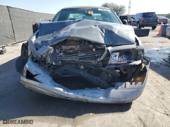1999 Ford Crown Victoria LX with VIN 2FAFP74W6XX235761, listed as a Copart auction lot 43565595 with 224,979 mi miles and Salvage Title. Bid and sale history available at carsss.com. Image 5.