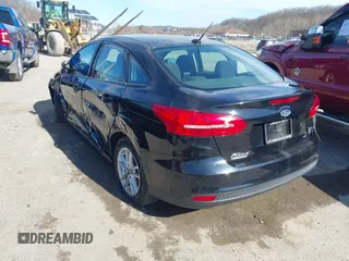 2016 Ford Focus SE with VIN 1FADP3F29GL304823, listed as a IAAI auction lot 41720924 with 82,245 mi miles. Bid and sale history available at carsss.com. Image 3.