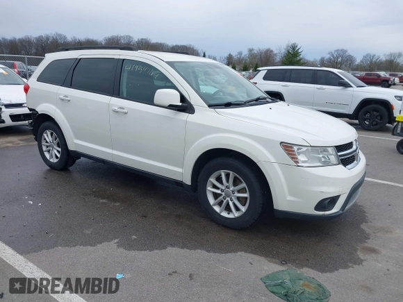 2013 Dodge Journey SXT with VIN 3C4PDCBG9DT564303, listed as a IAAI auction lot 41954764 with 132,125 mi miles. Bid and sale history available at carsss.com. Image 1.