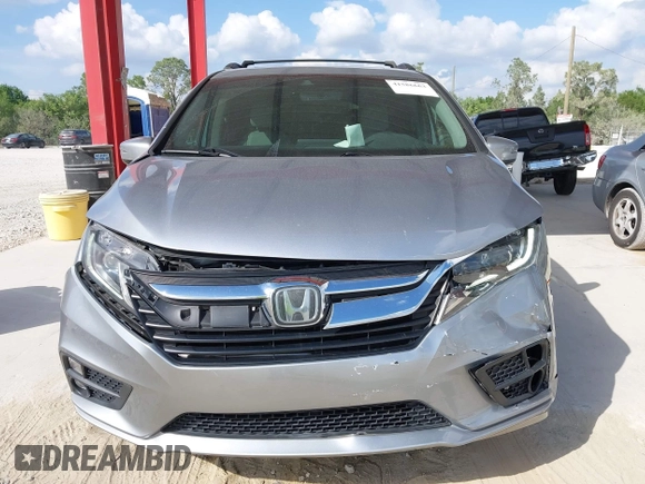 2020 Honda Odyssey EX-L with VIN 5FNRL6H72LB055672, listed as a IAAI auction lot 41586663 with 47,037 mi miles and . Bid and sale history available at carsss.com. Image 12.