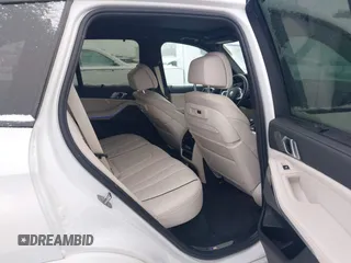 2020 BMW X5 M50i with VIN 5UXJU4C09LLE45658, listed as a IAAI auction lot 41307154 with 69,936 mi miles and . Bid and sale history available at DreamBid. Image 8.