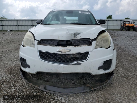 2013 Chevrolet Equinox LS z VIN 1GNALBEK3DZ116089, wystawiony jako Copart lot #54865075 z przebiegiem 188 632 mil mil oraz Szkoda całkowita • Salvage title. Historia ofert i sprzedaży dostępna na DreamBid. Obrazek 5.
