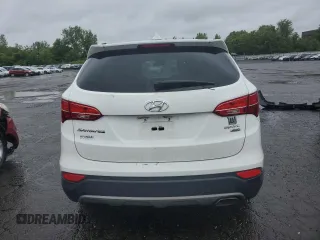 2016 Hyundai Santa Fe z VIN 5XYZTDLB6GG338557, wystawiony jako Copart lot #57899185 z przebiegiem 91 702 mil mil oraz Czysty tytuł • Clean title. Historia ofert i sprzedaży dostępna na DreamBid. Obrazek 6.