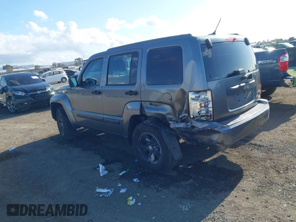 2012 Jeep Liberty Sport with VIN 1C4PJLAK2CW190883, listed as a IAAI auction lot 42066260 with 180,715 mi miles and . Bid and sale history available at carsss.com. Image 3.