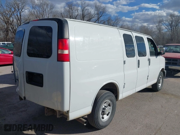 2014 Chevrolet Express Cargo with VIN 1GCWGFBA9E1140385, listed as a IAAI auction lot 38818319 with 366,153 mi miles. Bid and sale history available at carsss.com. Image 4.