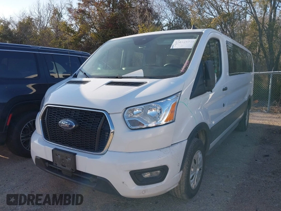 2021 Ford Transit Passenger XL z VIN 1FBAX2Y89MKA49850, wystawiony jako IAAI lot #41602893 z przebiegiem 74 248 mil mil oraz . Historia ofert i sprzedaży dostępna na DreamBid. Obrazek 17.