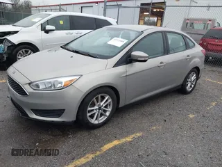 2015 Ford Focus SE with VIN 1FADP3F21FL376579, listed as a IAAI auction lot 41972088 with 129,593 mi miles. Bid and sale history available at carsss.com. Image 2.
