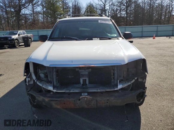 2003 GMC Envoy SLT z VIN 1GKET16S736179347, wystawiony jako Copart lot #52370775 z przebiegiem 230 623 mil mil oraz Szkoda całkowita • Salvage title. Historia ofert i sprzedaży dostępna na DreamBid. Obrazek 5.