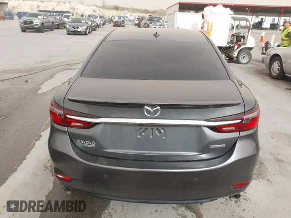 2020 Mazda 6 Signature with VIN JM1GL1XY6L1522900, listed as a IAAI auction lot 41724818 with 62,846 mi miles and . Bid and sale history available at DreamBid. Image 16.