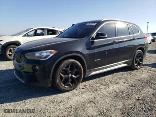 2018 BMW X1 sDrive28i with VIN WBXHU7C32J5H41525, listed as a Copart auction lot 41833615 with 87,001 mi miles and Salvage Title. Bid and sale history available at carsss.com. Image 1.