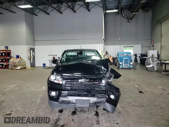 2021 Chevrolet Colorado 4WD Z71 with VIN 1GCGTDEN8M1171810, listed as a Copart auction lot 57409115 with 100,579 mi miles and Salvage title. Bid and sale history available at DreamBid. Image 13.