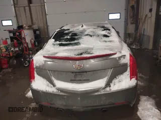 2016 Cadillac ATS Standard AWD z VIN 1G6AG5RX4G0120667, wystawiony jako IAAI lot #41512947 z przebiegiem 106 209 mil mil oraz . Historia ofert i sprzedaży dostępna na DreamBid. Obrazek 16.