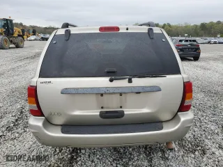 2004 Jeep Grand Cherokee Laredo with VIN 1J4GX48S84C263276, listed as a Copart auction lot 50401355 with 269,019 mi miles and Salvage Title. Bid and sale history available at carsss.com. Image 6.