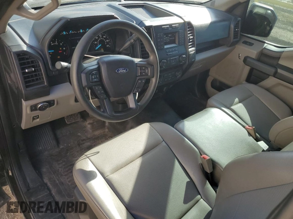 2020 Ford F-150 XL with VIN 1FTMF1C5XLKF15450, listed as a Copart auction lot 79884874 with 32,575 mi miles and Salvage Title. Bid and sale history available at carsss.com. Image 8.