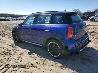 2016 MINI Countryman S with VIN WMWZC5C56GWP49473, listed as a Copart auction lot 50752355 with 118,060 mi miles and Salvage Title. Bid and sale history available at DreamBid. Image 2.