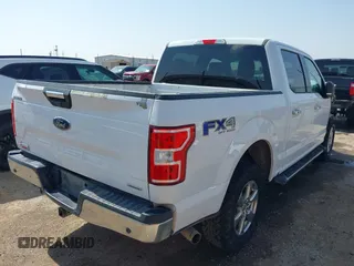 2018 Ford F-150 XL with VIN 1FTEW1EGXJKE70493, listed as a IAAI auction lot 42431141 with 106,786 mi miles and . Bid and sale history available at DreamBid. Image 4.