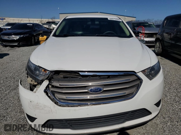 2014 Ford Taurus SE with VIN 1FAHP2D8XEG112805, listed as a Copart auction lot 48975265 with 127,730 mi miles and Salvage Title. Bid and sale history available at DreamBid. Image 5.
