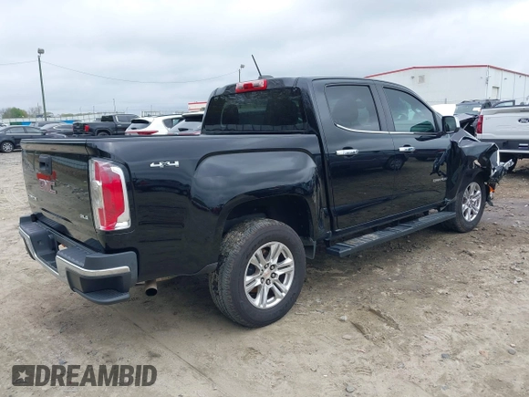 2019 GMC Canyon 4WD SLE with VIN 1GTG6CEN4K1329011, listed as a IAAI auction lot 41920100 with 82,343 mi miles. Bid and sale history available at carsss.com. Image 4.