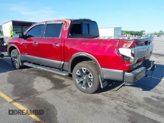 2021 Nissan Titan Pro-4X with VIN 1N6AA1ED4MN525555, listed as a IAAI auction lot 42563247 with 63,259 mi miles and . Bid and sale history available at DreamBid. Image 3.