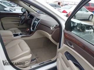 2016 Cadillac SRX Luxury Collection z VIN 3GYFNBE36GS519495, wystawiony jako IAAI lot #42147882 z przebiegiem 126 689 mil mil oraz . Historia ofert i sprzedaży dostępna na DreamBid. Obrazek 5.