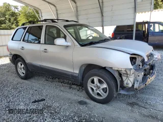 2001 Hyundai Santa Fe GLS with VIN KM8SC83D31U010136, listed as a Copart auction lot 69809604 with 79,823 mi miles and Salvage Title. Bid and sale history available at carsss.com. Image 4.