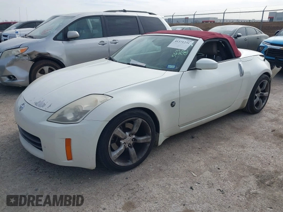 2006 Nissan 350Z Touring with VIN JN1AZ36A06M452000, listed as a IAAI auction lot 41371231 with 227,403 mi miles. Bid and sale history available at carsss.com. Image 2.