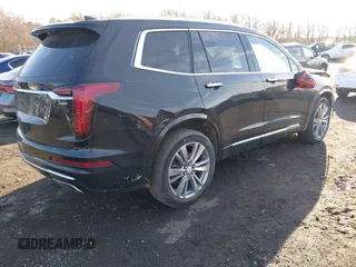2023 Cadillac XT6 FWD Premium Luxury with VIN 1GYKPCRS1PZ105964, listed as a IAAI auction lot 41525039 with 70,603 mi miles and . Bid and sale history available at DreamBid. Image 4.