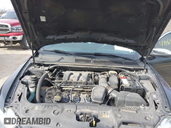 2013 Ford Taurus Limited with VIN 1FAHP2F80DG114817, listed as a IAAI auction lot 41865803 with 207,132 mi miles. Bid and sale history available at carsss.com. Image 10.