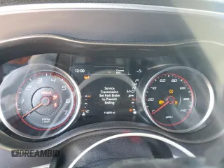 2019 Dodge Charger SXT with VIN 2C3CDXBGXKH659890, listed as a Copart auction lot 58011735 with 112,293 mi miles and Salvage title. Bid and sale history available at DreamBid. Image 9.